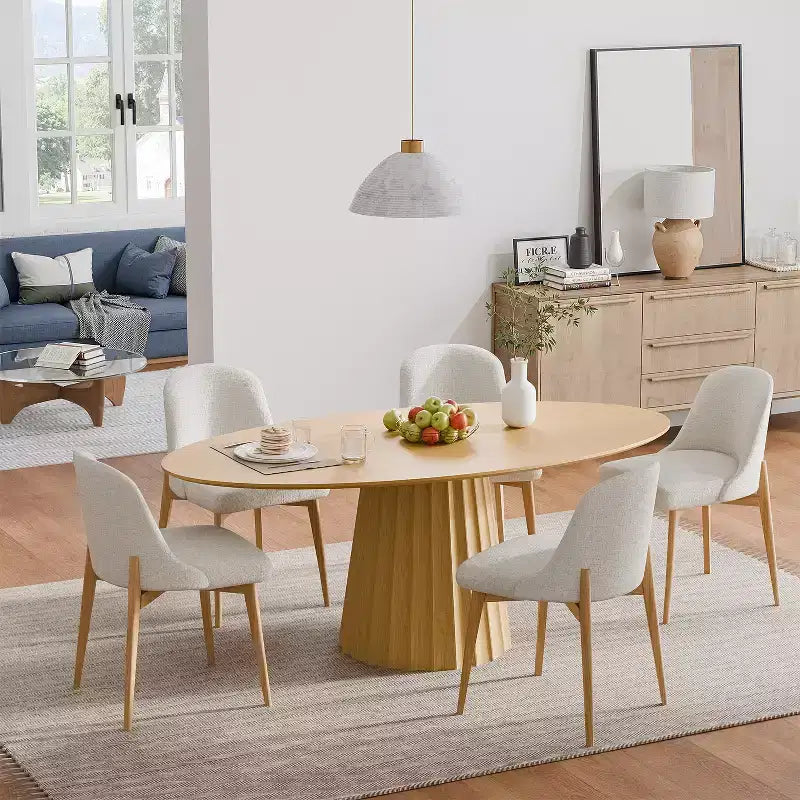 Table à manger ovale en bois massif avec piétement fuselé élégant pour 6 personnes
