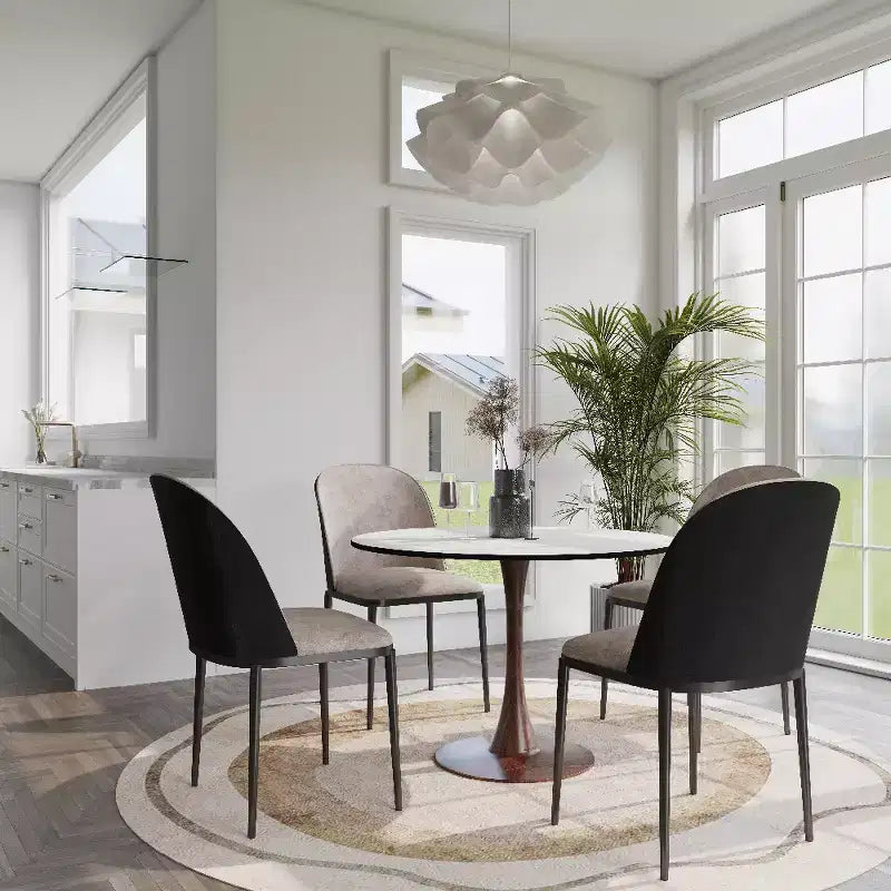 Table à manger ronde avec plateau en pierre frittée et piètement central en noyer et acier